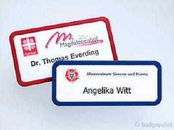 Badgepoint - Name tag systems - We make your name visible fra Dansk Erhvervsbeklædning. - som Standardprodukter, Individuelle produkter, og som Brancheløsninger: Navneskilte, Reversskilte, Bordskilte, Kampagneskilte, Badge, med tryk og gravering, efter opgaven.