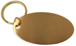 18416 33006 Navneskilt i messing med gravering. Dimensioner: 45 mm. x 63 mm. x 1 mm..