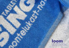 Terry Towel - Produced in jacquard weaving with logo all over the towel