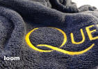Terry Towel - Produced in relief weaving with logo all over the towel. Finished with embroidered second logo