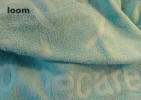 Terry Towel - Produced in relief weaving with logo all over the towel