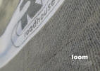 Velour Finish Terry Towel - Produced in twisted yarn with customer logo in a jacquard border weaved in the towel